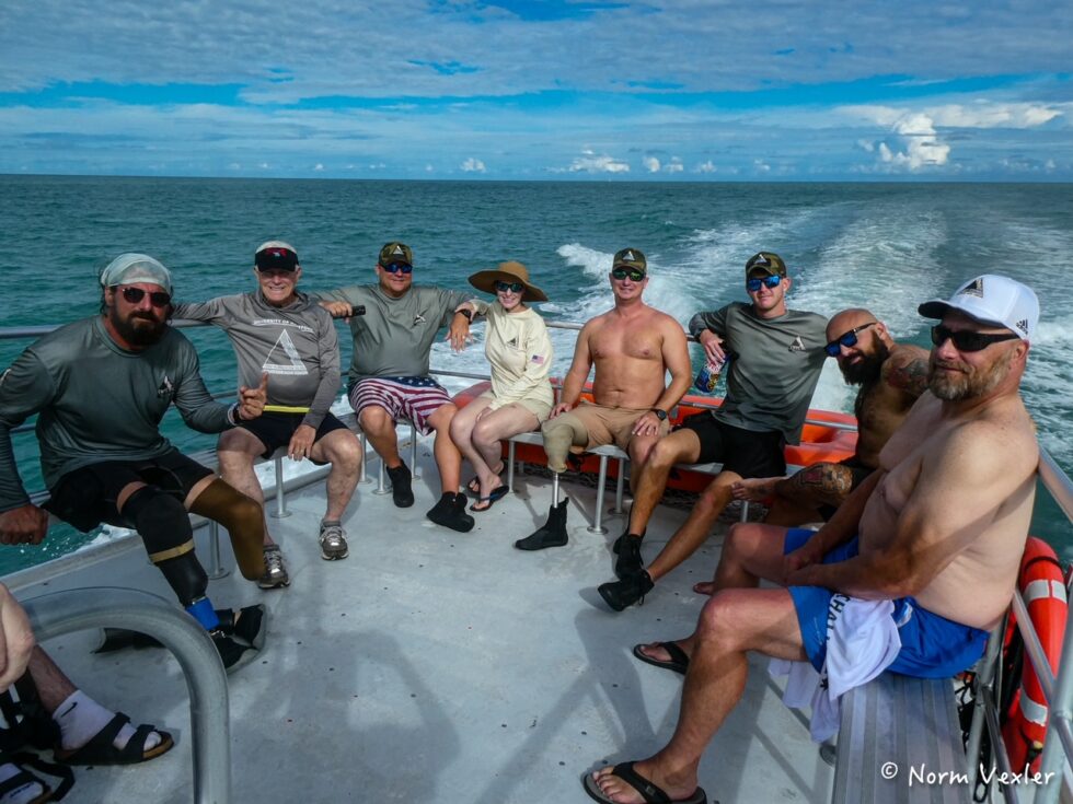 Combat wounded SCUBA divers on a boat